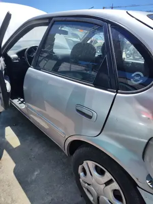 Foto de PUERTA TRASERA IZQUIERDA TOYOTA COROLLA (E11) 2.0 Turbodiesel CAT (90 CV / 66 KW) referencia 6700402141
