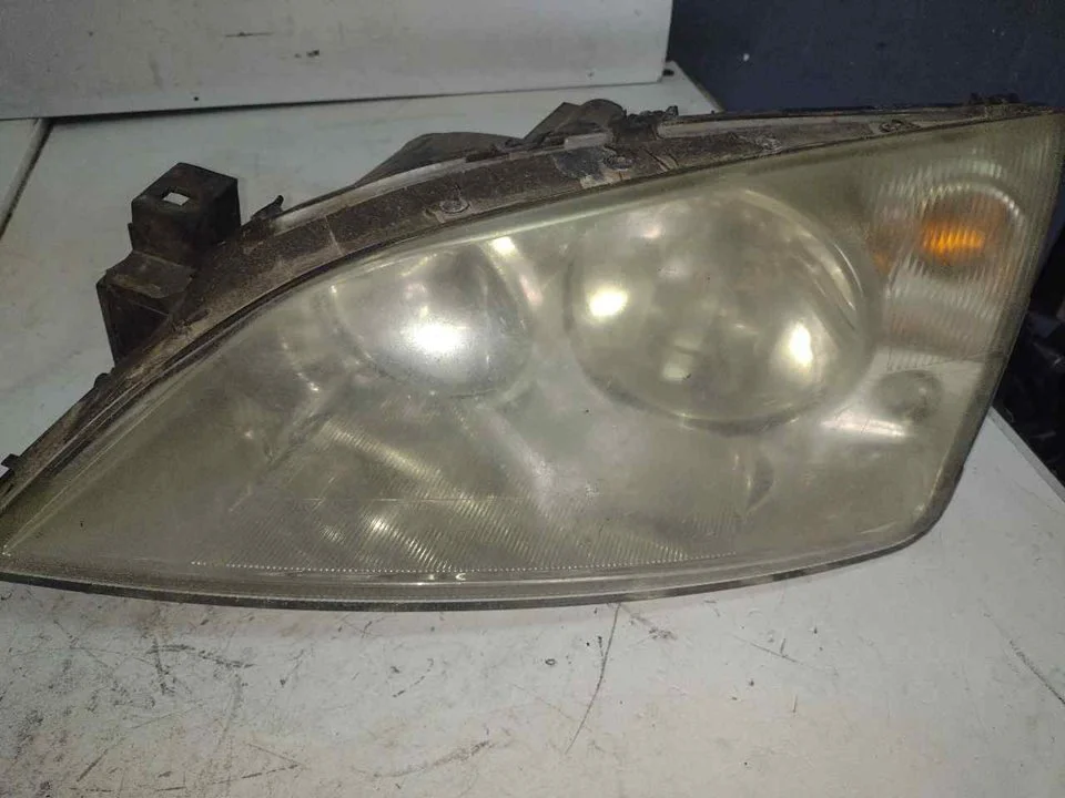 Foto de FARO IZQUIERDO FORD MONDEO TURNIER (GE) 2.0 TDCi CAT (131 CV / 96 KW) referencia 1S7113006AK