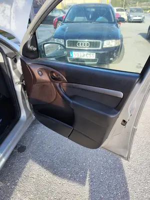 Foto de GUARNECIDO PUERTA DELANTERA DERECHA FORD FOCUS FAMILIAR (CAK) 1.8 16V CAT (116 CV / 85 KW) referencia 1311252 foto 2
