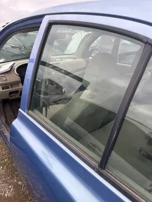 Foto de LUNA TRASERA IZQUIERDA NISSAN MICRA (K12E) 1.2 CAT (65 CV / 48 KW)