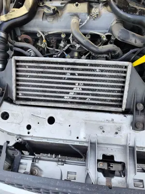 Foto de INTERCOOLER FORD FOCUS FAMILIAR (CAK) 1.8 TDCi Turbodiesel CAT (116 CV / 85 KW)