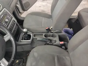 Foto de CONSOLA CENTRAL FORD FOCUS BERLINA (CAP) 1.8 Flexifuel CAT (125 CV / 92 KW)