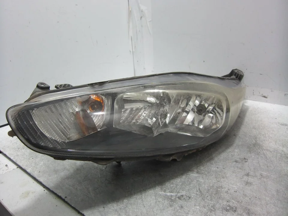 Foto de FARO IZQUIERDO FORD FIESTA (CNN) 1.25 16V CAT (82 CV / 60 KW) referencia C1BB13W00AH