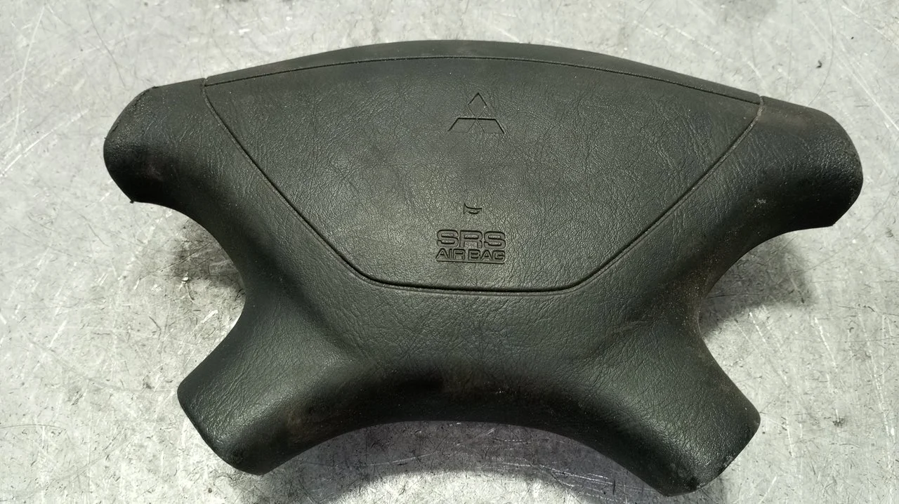 Foto de AIRBAG DELANTERO IZQUIERDO MITSUBISHI GALANT BERLINA (E50) 2.5 V6 CAT (170 CV / 125 KW) referencia MR763197