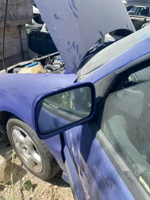 Foto de RETROVISOR IZQUIERDO VOLKSWAGEN POLO III (6N1) 1.4  (60 CV / 44 KW)