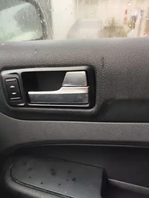 Foto de MANETA INTERIOR TRASERA DERECHA FORD FOCUS BERLINA (CAP) 1.8 TDCi Turbodiesel CAT (116 CV / 85 KW) referencia 1470111 foto 4