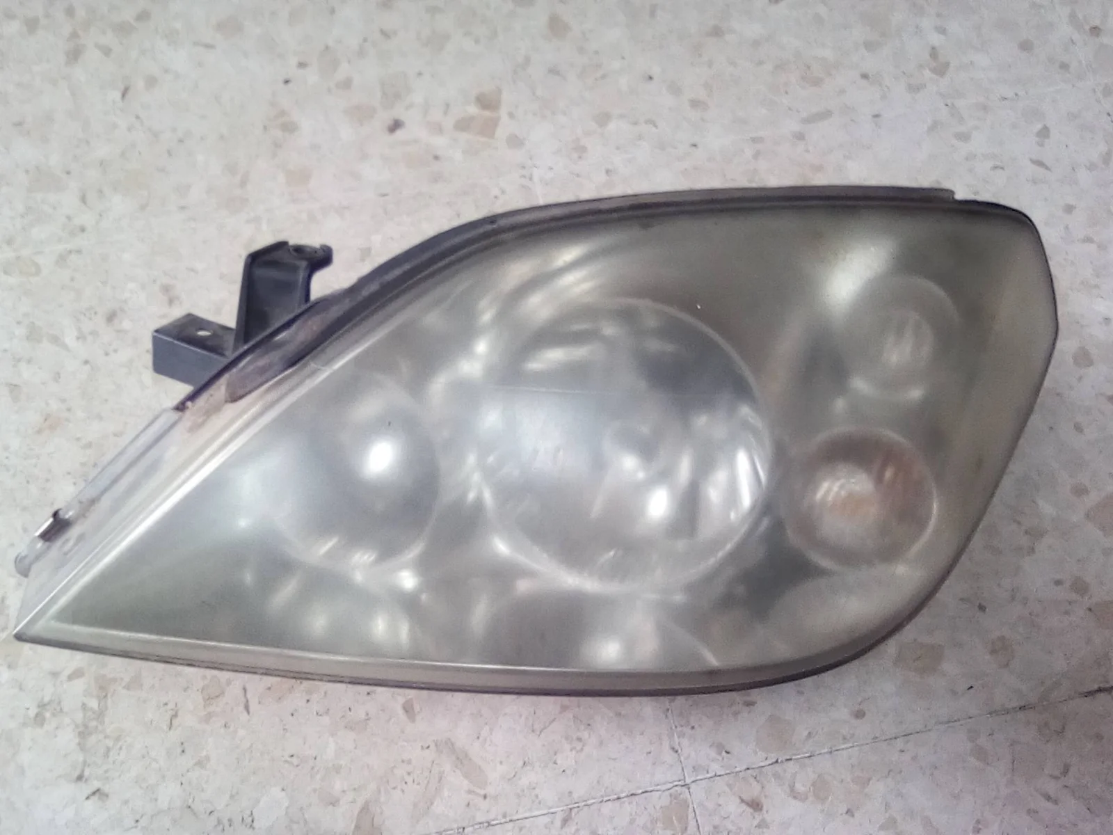 Foto de FARO IZQUIERDO NISSAN PRIMERA BERLINA (P12) referencia 26060AU810