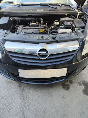 Foto de REJILLA DELANTERA OPEL CORSA D 1.2 16V CAT (Z 12 XEP / LB4) (80 CV / 59 KW)