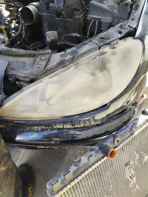 Foto de FARO IZQUIERDO PEUGEOT 206 1.4  (75 CV / 55 KW) referencia 6204S7