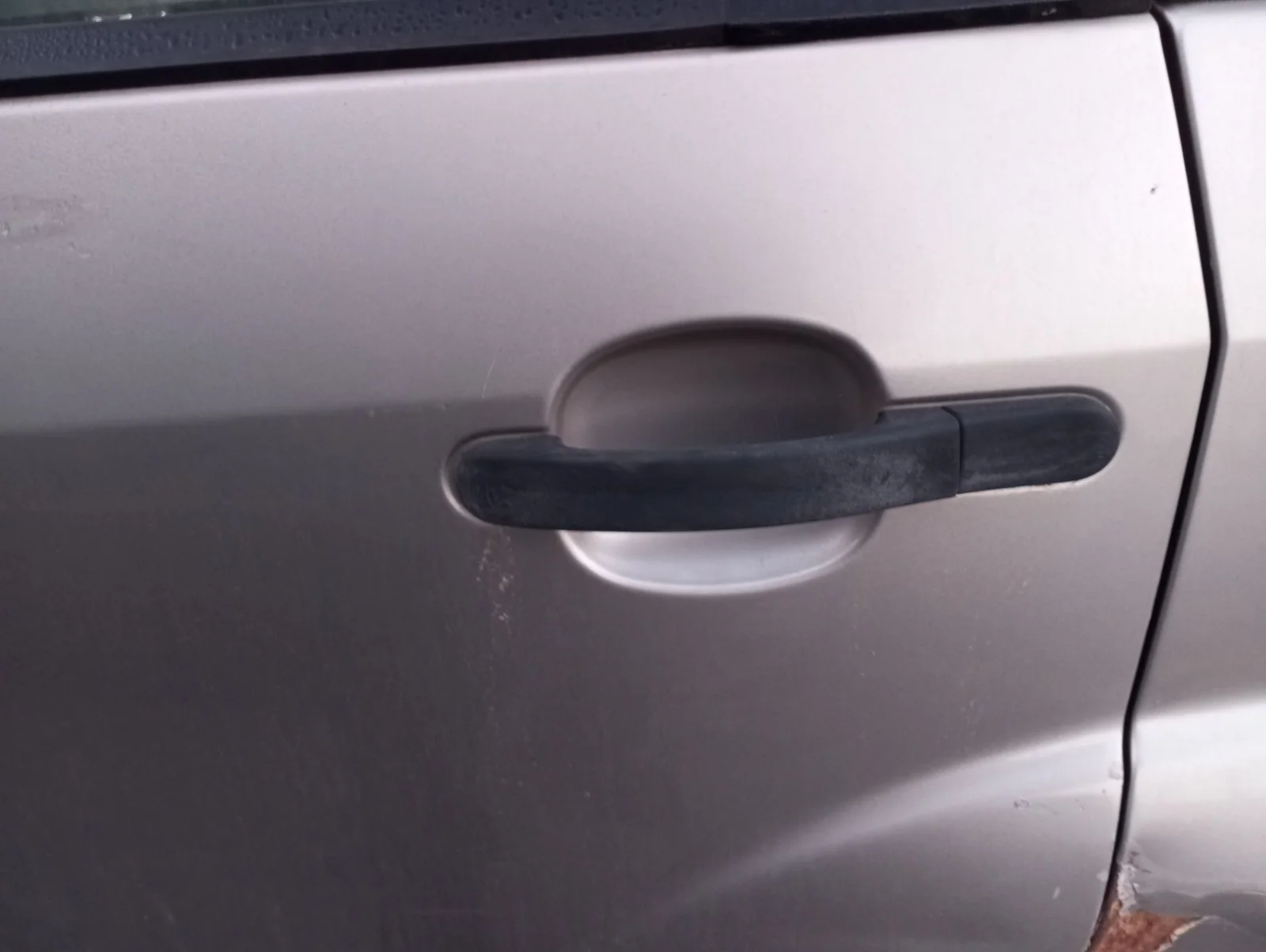Foto de MANETA EXTERIOR TRASERA IZQUIERDA FORD FIESTA (CBK) 1.4 TDCi CAT (68 CV / 50 KW) referencia 1521067