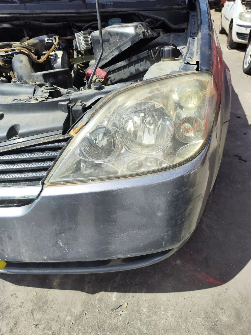 Foto de FARO IZQUIERDO NISSAN PRIMERA BERLINA (P12) 2.2 16V Turbodiesel CAT (126 CV / 93 KW) referencia 26060AU80B