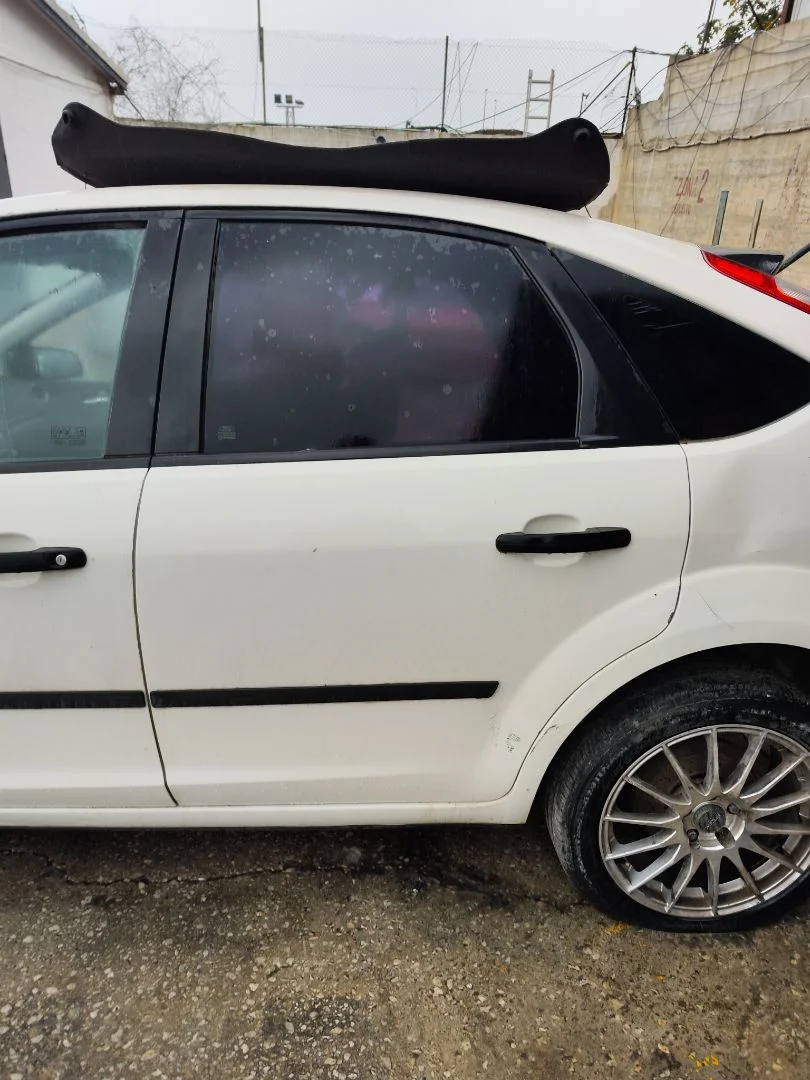 Foto de PUERTA TRASERA IZQUIERDA FORD FOCUS BERLINA (CAP) 1.6 TDCi CAT (90 CV / 66 KW) referencia 1505763