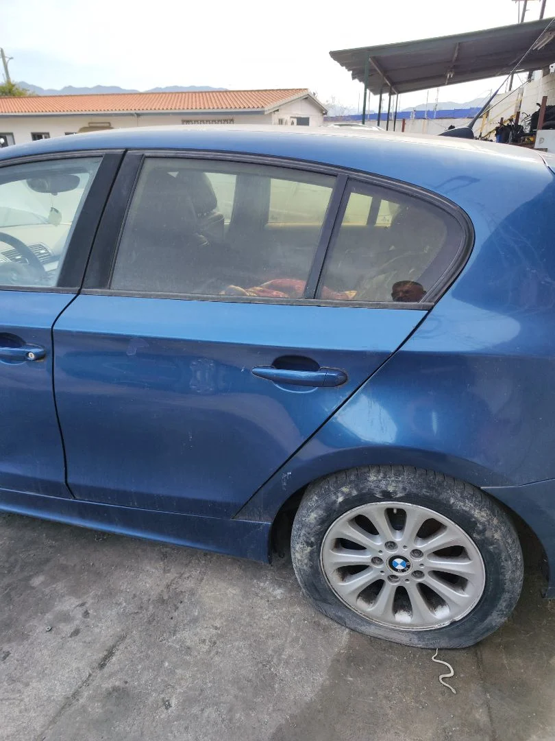 Foto de PUERTA TRASERA IZQUIERDA BMW SERIE 1 BERLINA (E81/E87) 2.0 16V Diesel CAT (122 CV / 90 KW) referencia 41527191017