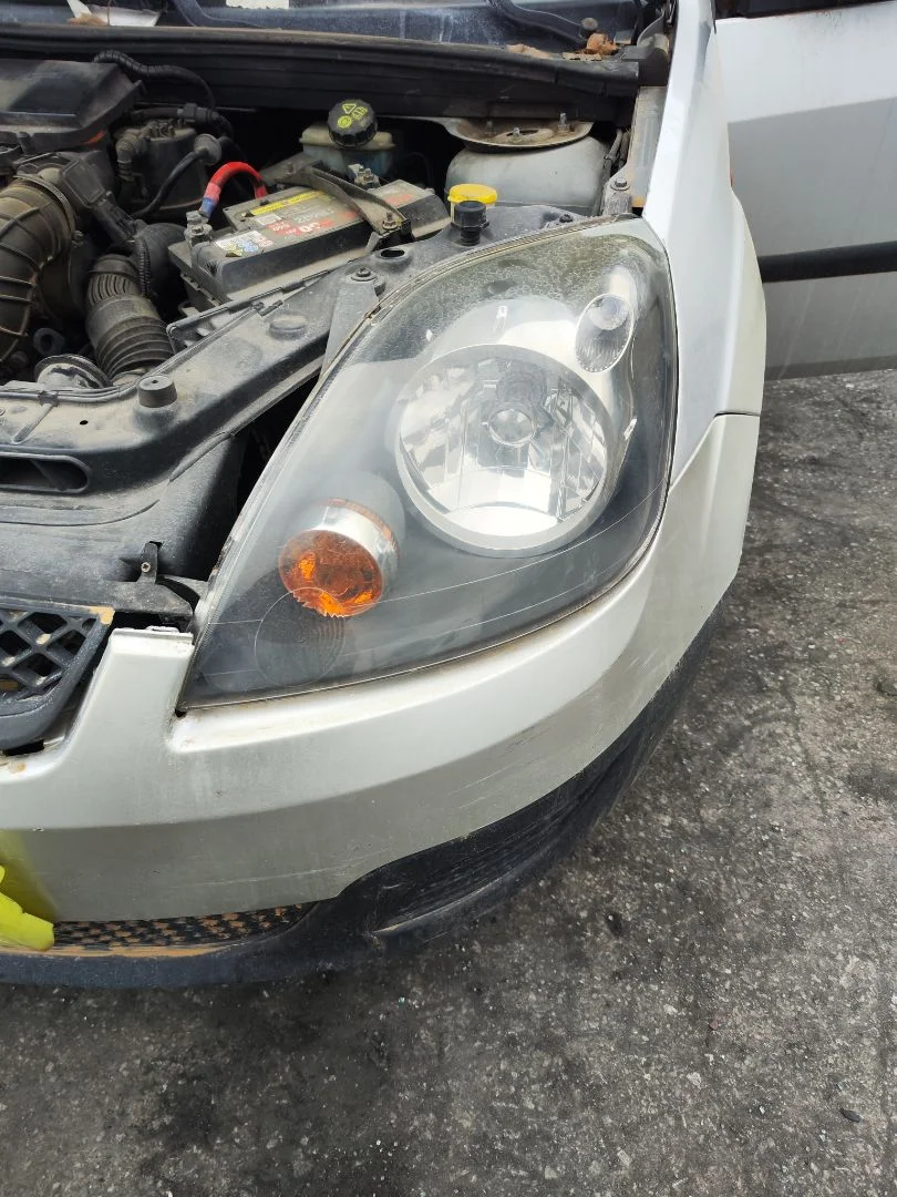 Foto de FARO IZQUIERDO FORD FIESTA (CBK) 1.4 16V CAT (80 CV / 59 KW) referencia 1416311