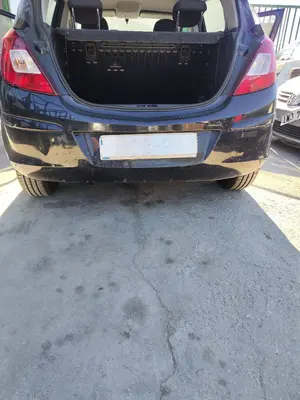 Foto de PARAGOLPES TRASERO OPEL CORSA D 1.2 16V CAT (Z 12 XEP / LB4) (80 CV / 59 KW)
