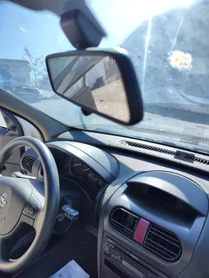 Foto de RETROVISOR INTERIOR OPEL CORSA C 1.2 16V CAT (Z 12 XE / LW4) (75 CV / 55 KW)