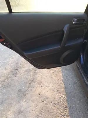 Foto de GUARNECIDO PUERTA TRASERA IZQUIERDA MAZDA 6 BERLINA (GH) 2.2 Turbodiesel CAT (163 CV / 120 KW) referencia GS1E-68-560GFKZ