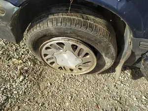 Foto de PINZA DE FRENO DELANTERA IZQUIERDA CHRYSLER VOYAGER GS 2.5 Turbodiesel (116 CV / 85 KW)