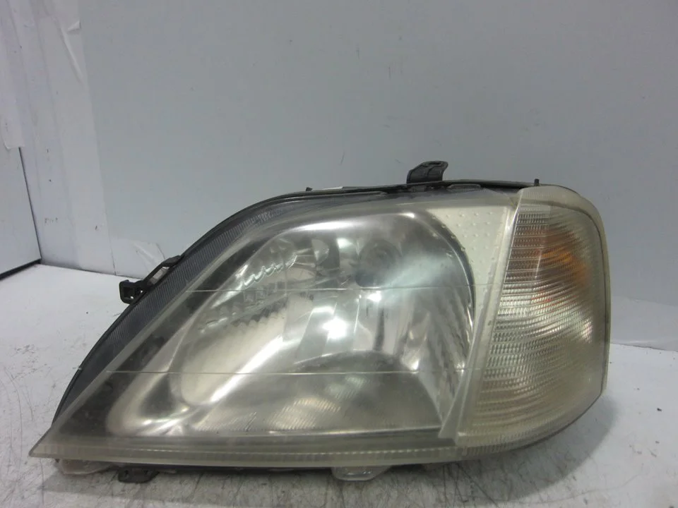 Foto de FARO IZQUIERDO DACIA LOGAN 1 1.6 CAT (87 CV / 64 KW) referencia 8200211005