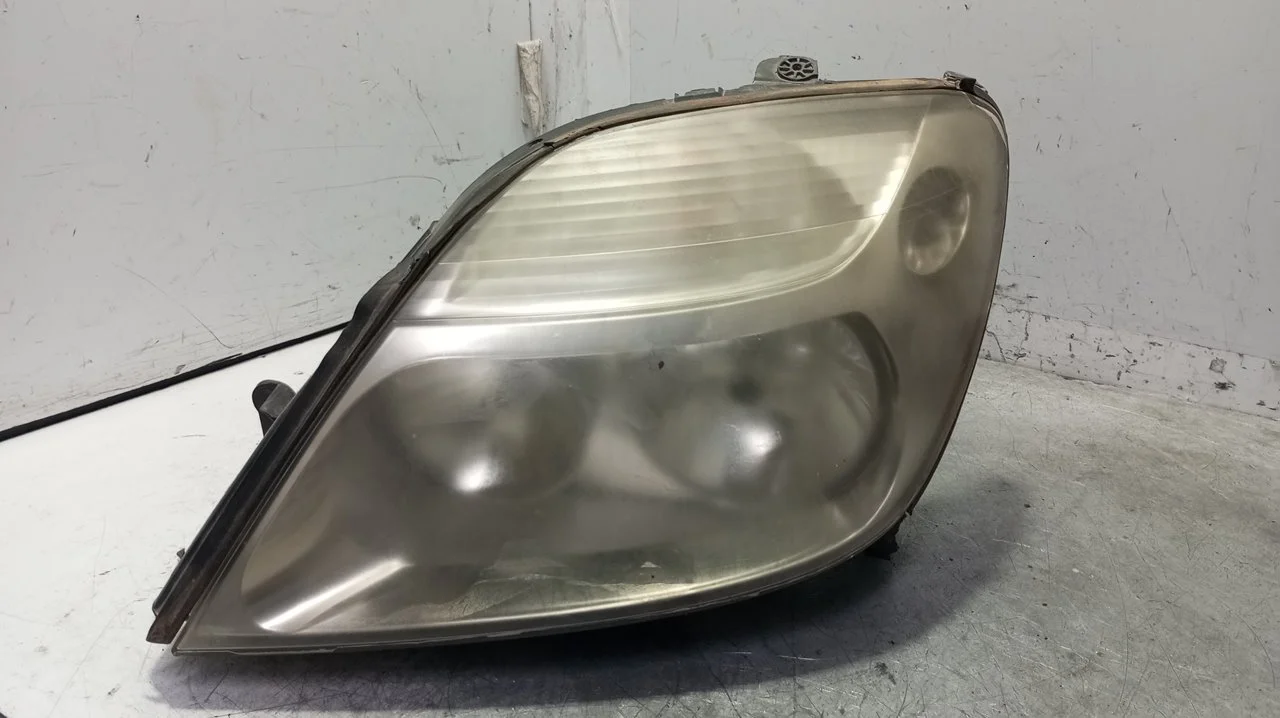 Foto de FARO IZQUIERDO RENAULT SCENIC I (JA...) 1.9 dTi Diesel (80 CV / 59 KW) referencia 7700432098