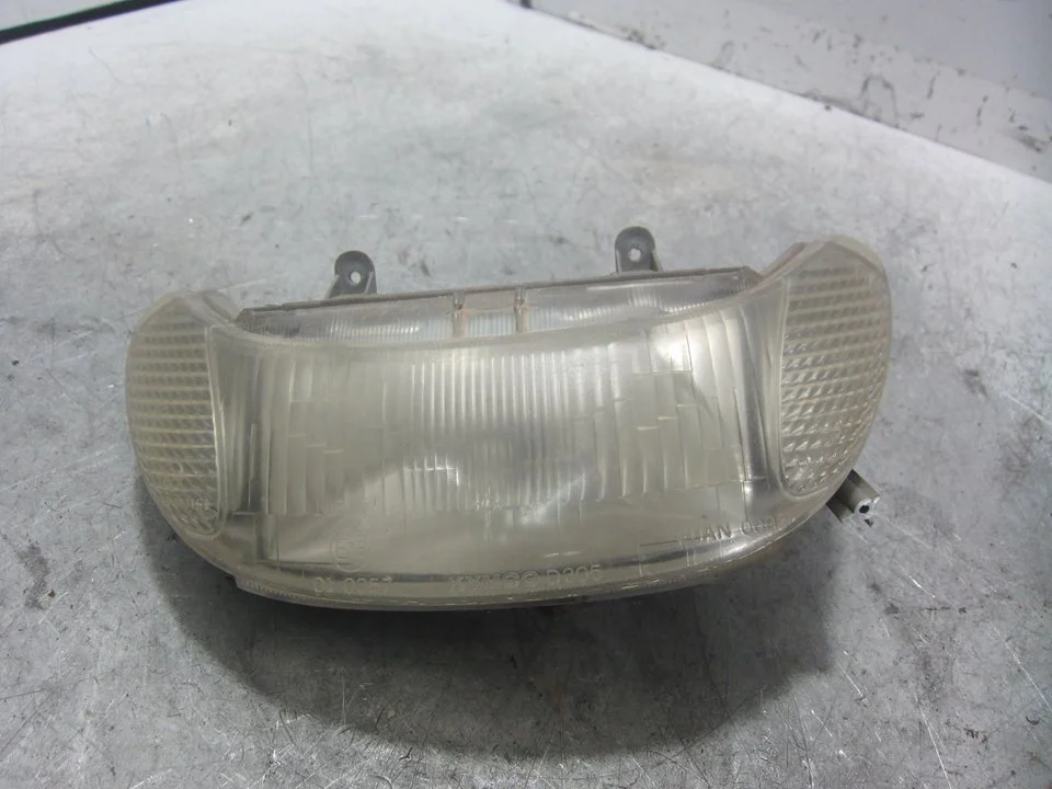 Foto de FARO DELANTERO KYMCO SCOUT 50 referencia 010057