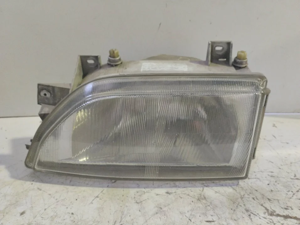 Foto de FARO IZQUIERDO FORD ESCORT BERL./TURNIER referencia 7R01472