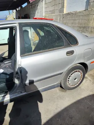 Foto de PUERTA TRASERA IZQUIERDA VOLVO S40 BERLINA 1.9 Diesel CAT (116 CV / 85 KW) referencia 30882901