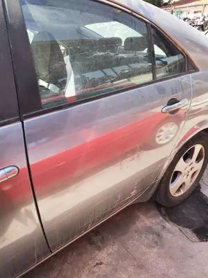 Foto de PUERTA TRASERA IZQUIERDA NISSAN PRIMERA BERLINA (P12) 1.9 16V Turbodiesel CAT (120 CV / 88 KW) referencia 82101BA030