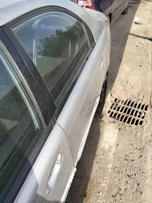 Foto de PUERTA TRASERA IZQUIERDA KIA SEPHIA II