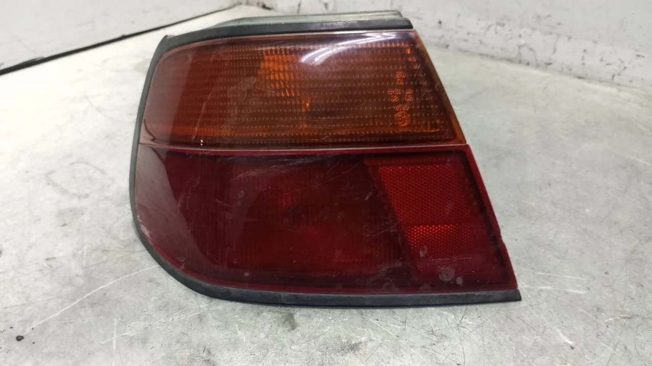 Foto de PILOTO TRASERO IZQUIERDO NISSAN ALMERA (N15) 1.4 16V CAT (87 CV / 64 KW) referencia 0821519A2L