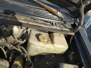 Foto de DEPOSITO LIMPIA CHRYSLER VOYAGER GS 2.5 Turbodiesel (116 CV / 85 KW)