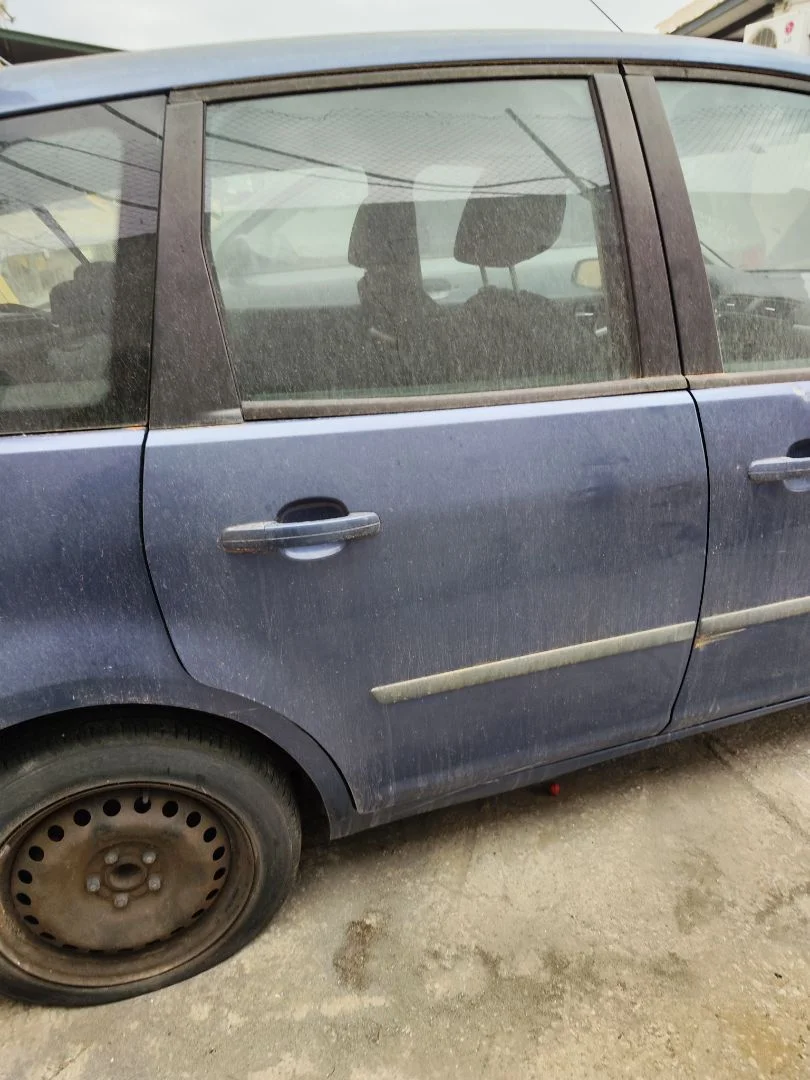 Foto de PUERTA TRASERA DERECHA FORD FOCUS C-MAX (CAP)(2003) 1.6 TDCi CAT (109 CV / 80 KW) referencia 1496875