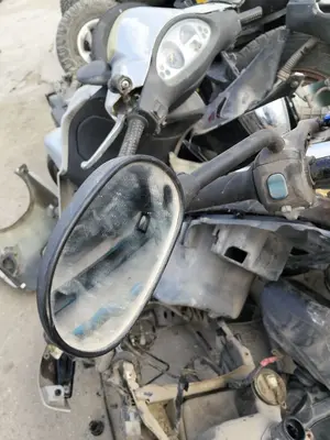 Foto de RETROVISOR IZQUIERDO PEUGEOT VIVACITY 49 cm3 - 3.0 kW (0 CV / 0 KW)