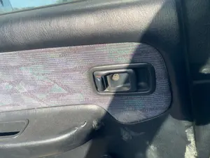 Foto de MANETA INTERIOR TRASERA IZQUIERDA NISSAN ALMERA (N15) 2.0 Diesel (75 CV / 55 KW)