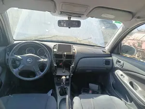 NISSAN ALMERA (N16/E) foto 2